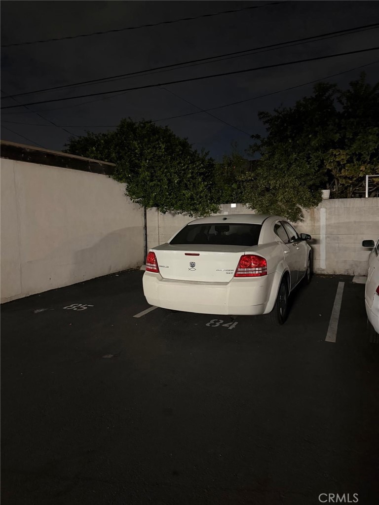 1602 North King Street, Unit S4 Santa Ana, CA 92706 - Photo 22 of 22 a white car parked in the kitchen