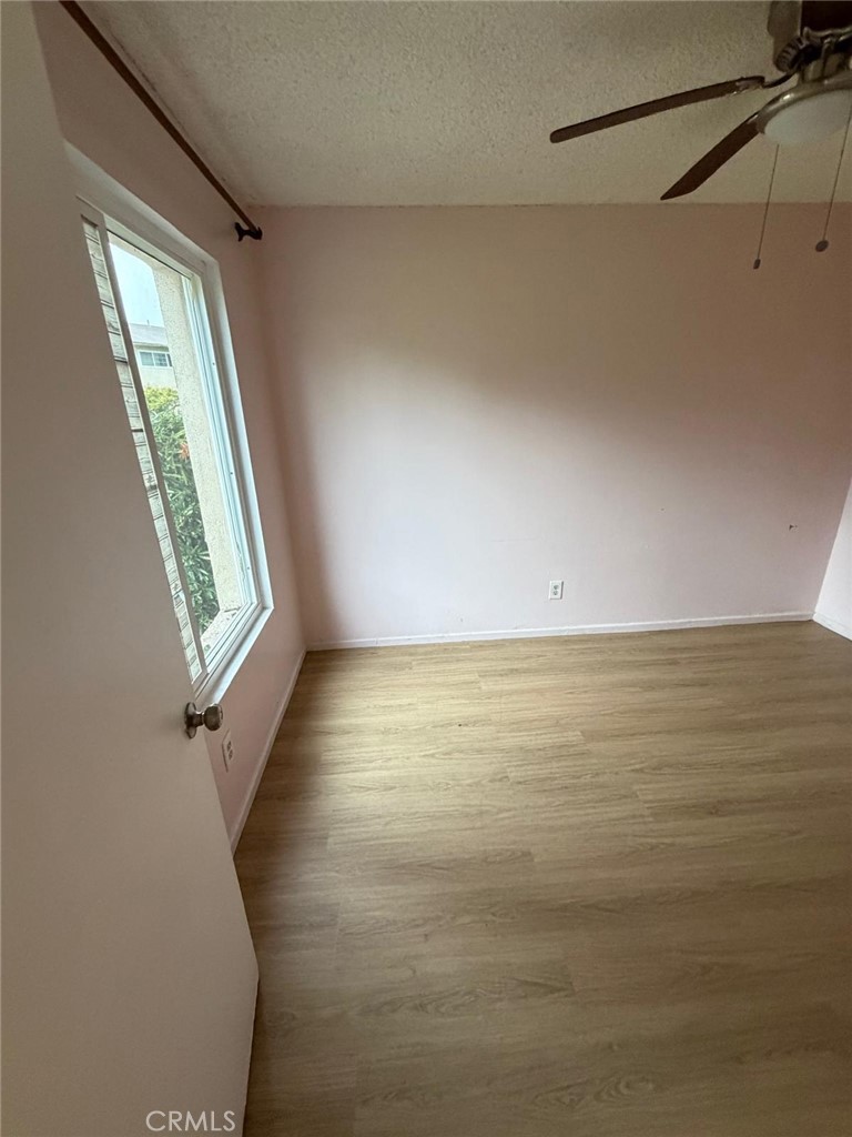 1602 North King Street, Unit S4 Santa Ana, CA 92706 - Photo 4 of 22 a view of room with stairs