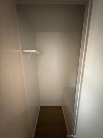 a view of small space with racks on the wall