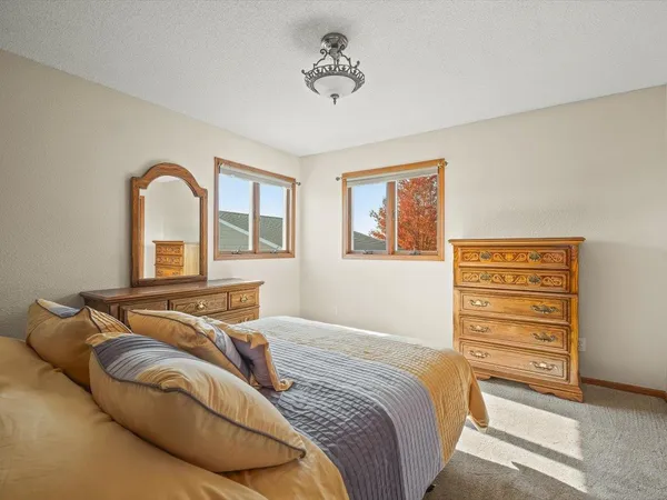 a view of empty room with windows