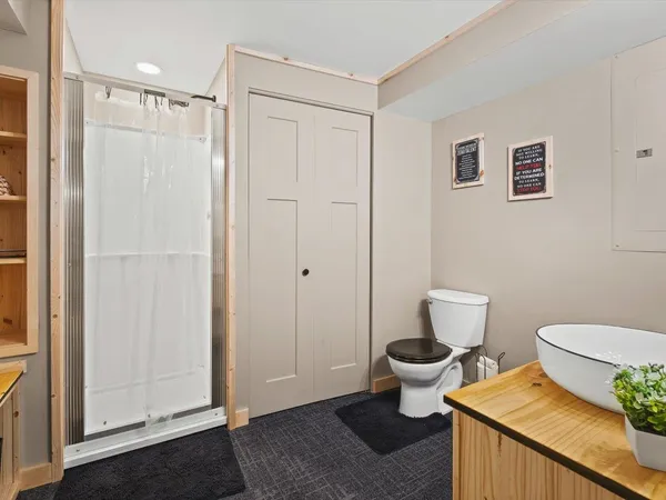 a view of a livingroom with furniture and window