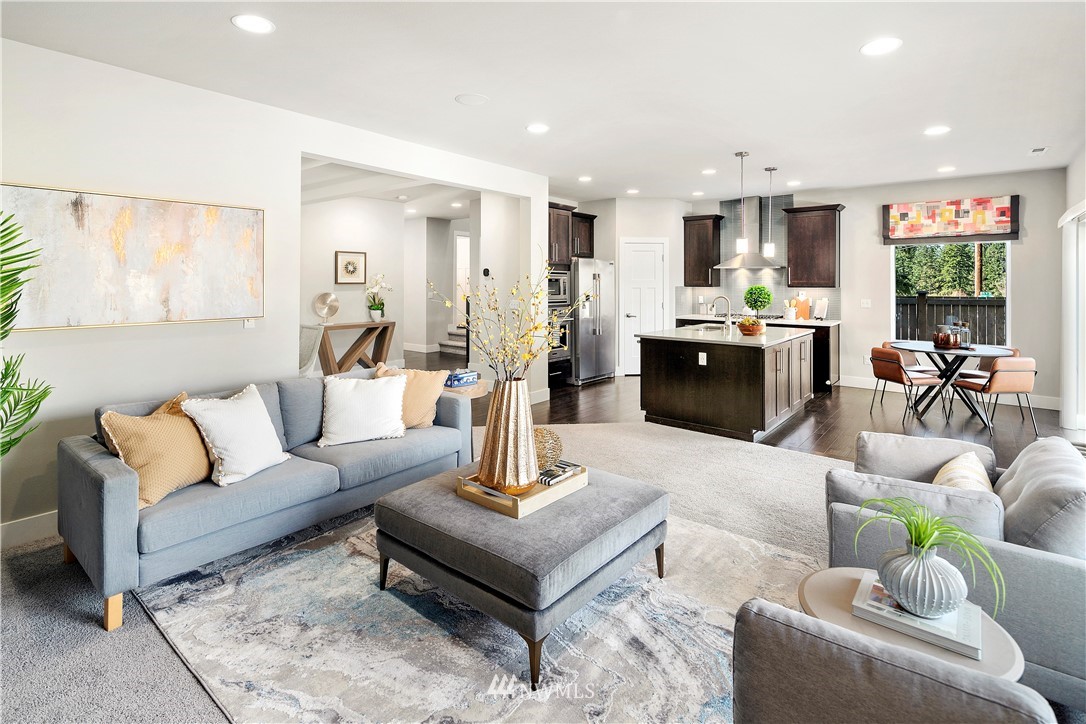 207 176th Place Southwest Bothell, WA 98012 - Photo 12 of 36 a living room with furniture and a large window