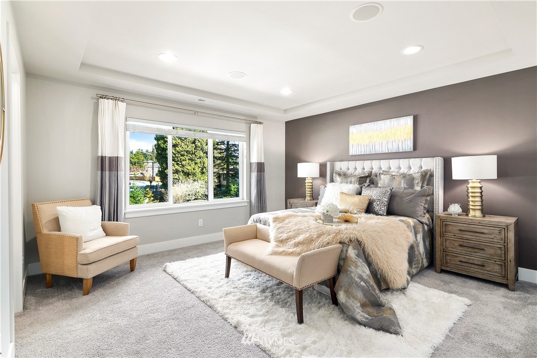 207 176th Place Southwest Bothell, WA 98012 - Photo 14 of 36 a bedroom with a bed and a couch