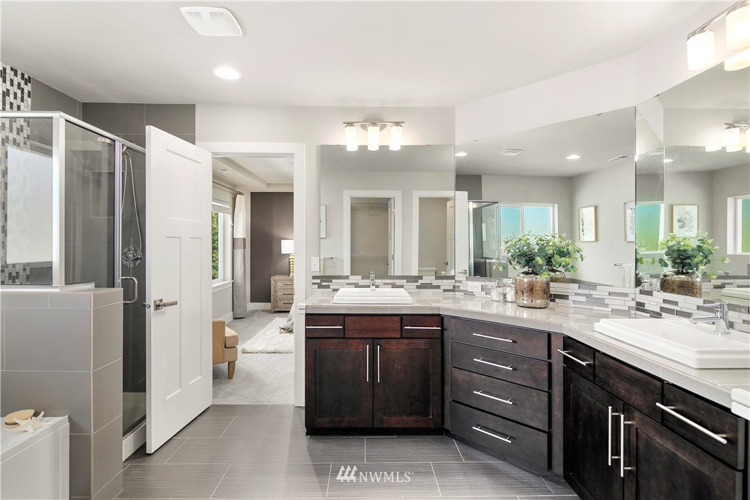 207 176th Place Southwest Bothell, WA 98012 - Photo 19 of 36 a kitchen with a sink and cabinets