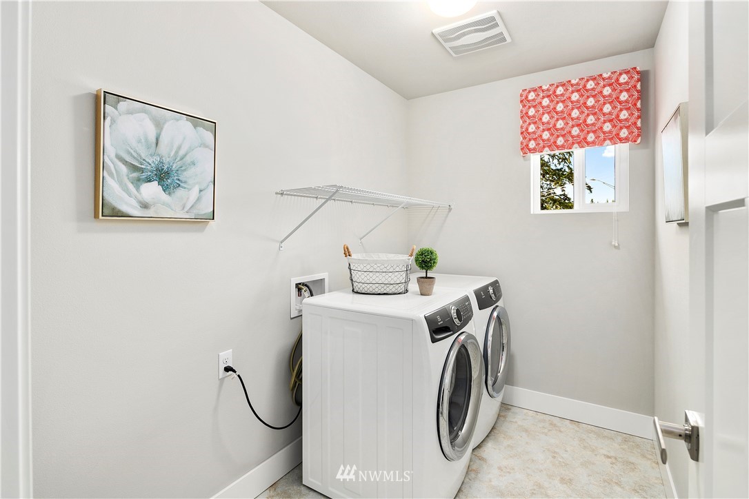 207 176th Place Southwest Bothell, WA 98012 - Photo 21 of 36 a utility room with dryer and washer