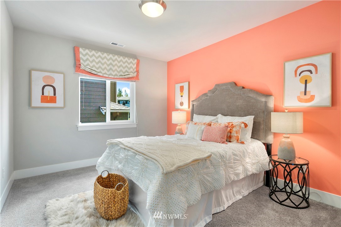 207 176th Place Southwest Bothell, WA 98012 - Photo 24 of 36 a bedroom with a bed and window