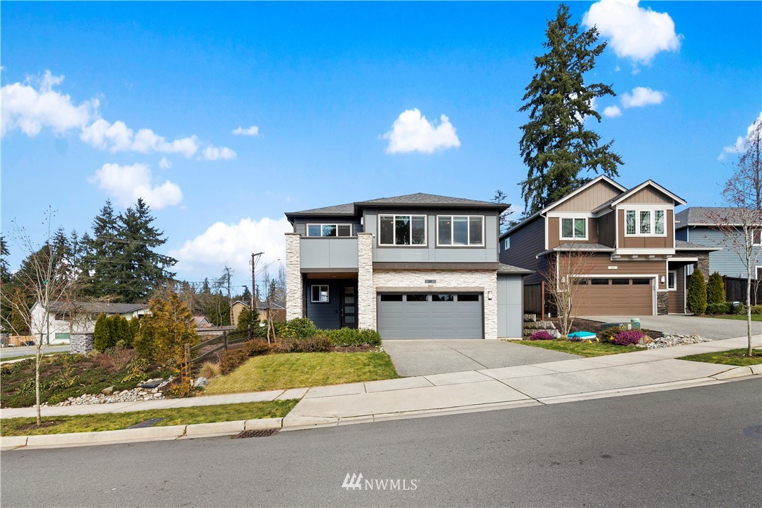 207 176th Place Southwest Bothell, WA 98012 - Photo 35 of 36 a view of a house with a swimming pool