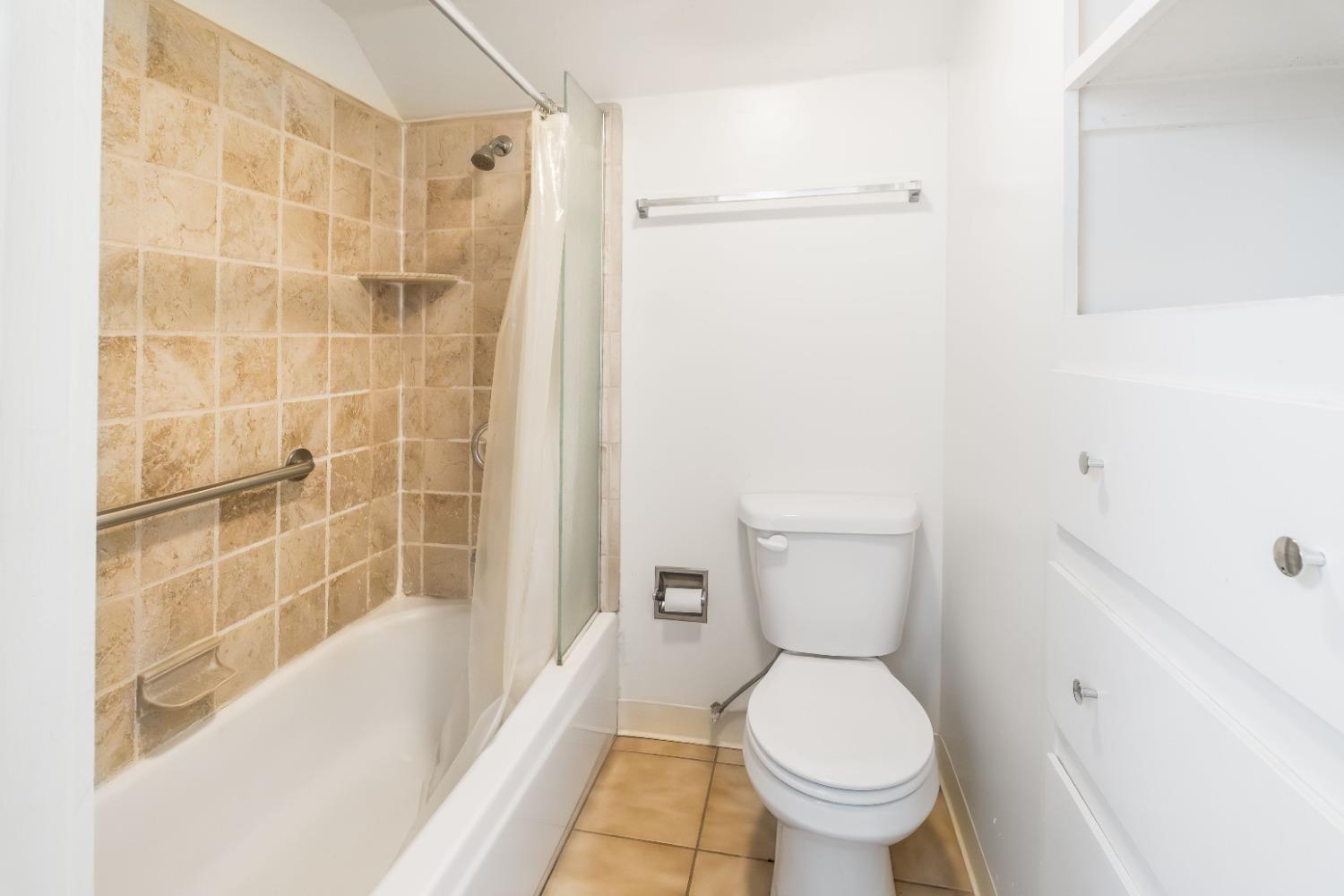 36659 Douglas Ranger Station Road North Fork, CA 93643 - Photo 15 of 38 a bathroom with a toilet and a shower