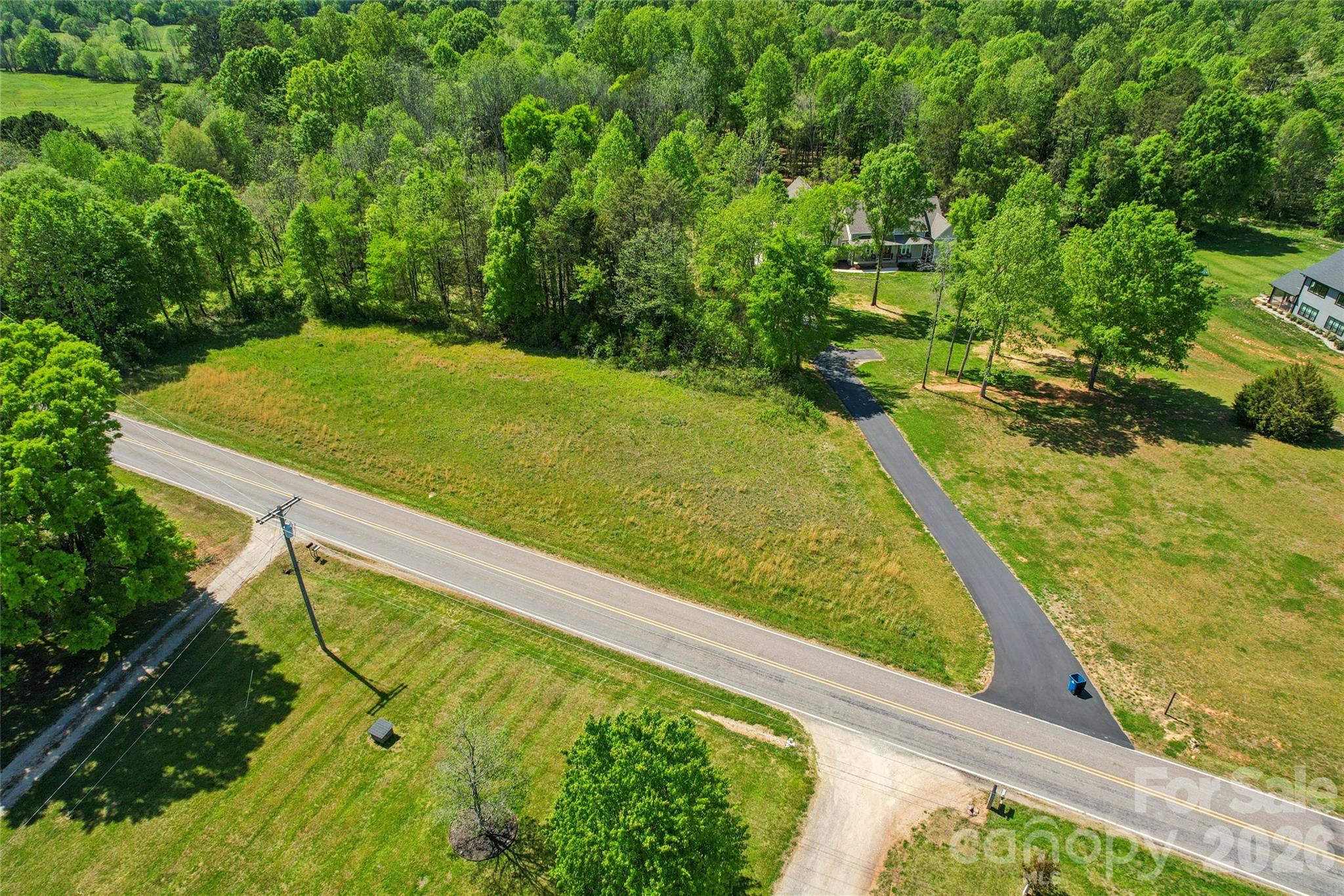 1025 Patterson Farm Road Mooresville, NC 28115 - Photo 2 of 14 a view of yard from a balcony