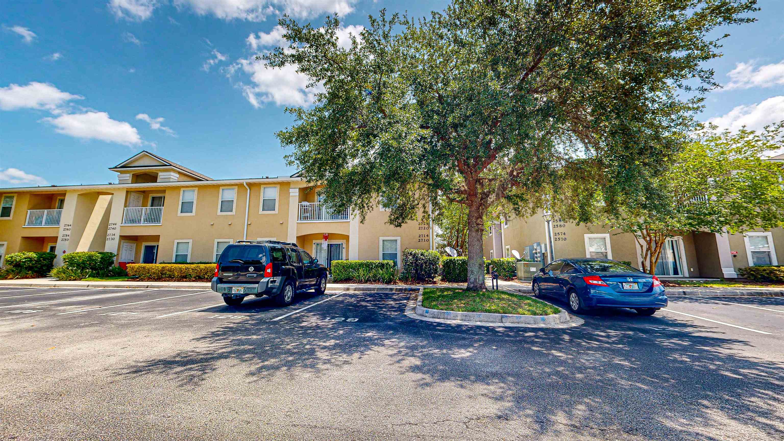 2724 Golden Lake Loop St. Augustine, FL 32084 - Photo 2 of 43 a car parked in front of a house