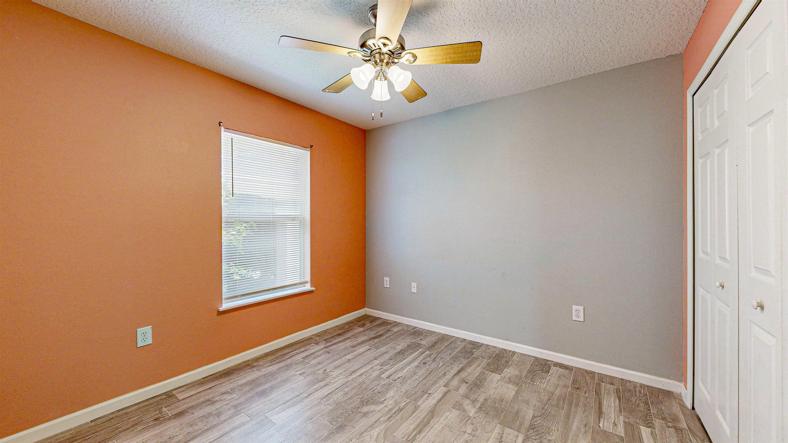 2724 Golden Lake Loop St. Augustine, FL 32084 - Photo 28 of 43 an empty room with a window and a fan