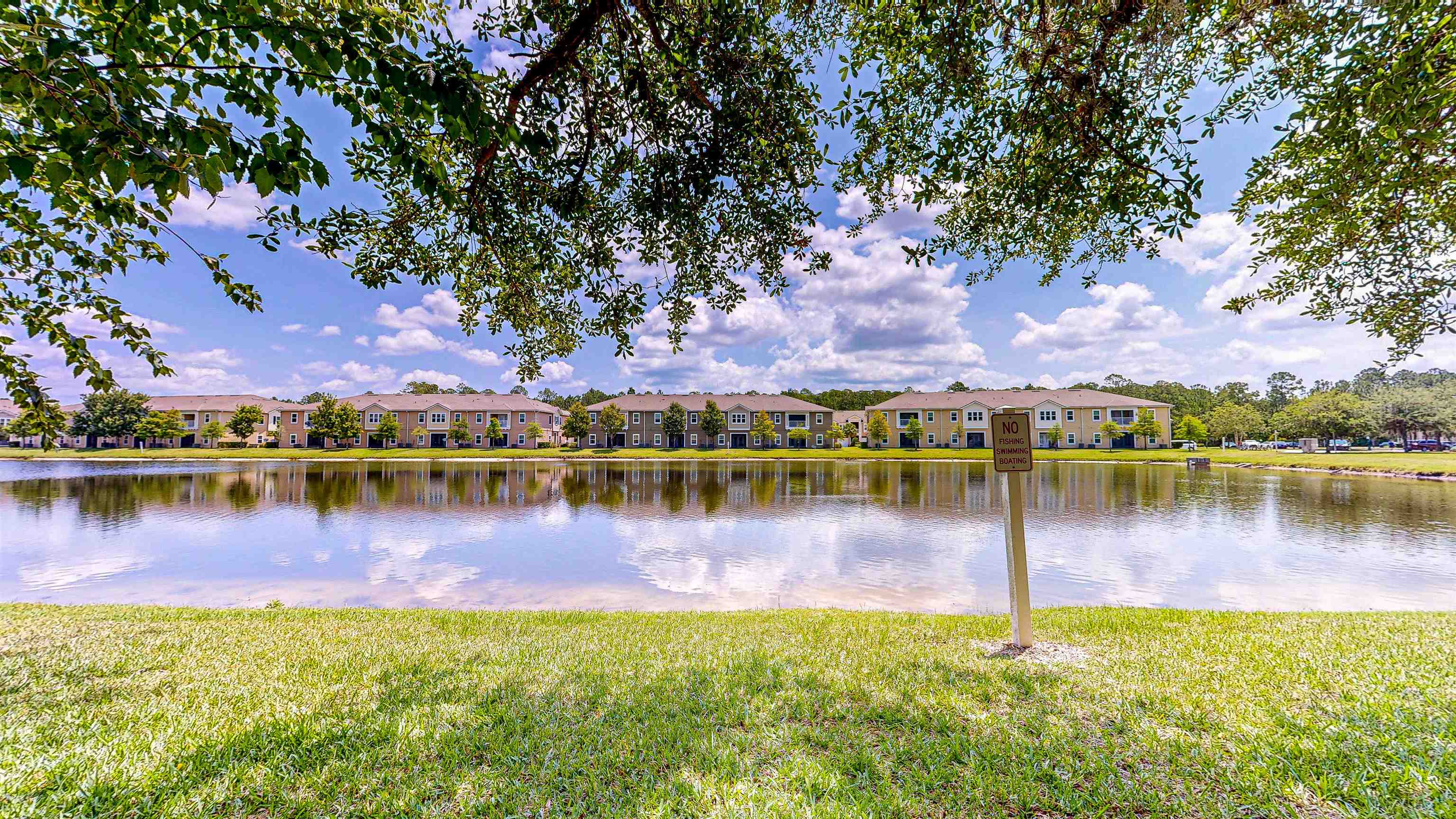 2724 Golden Lake Loop St. Augustine, FL 32084 - Photo 42 of 43 a view of a lake in a city