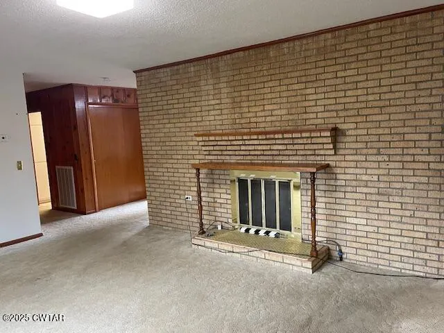 a view of a door with wooden walls