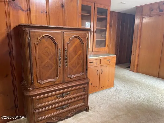a view of a door with a washer and dryer