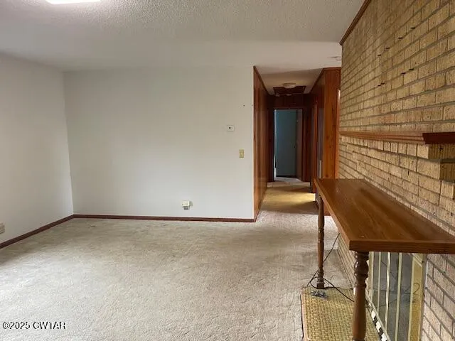 a view of a livingroom with a staircase