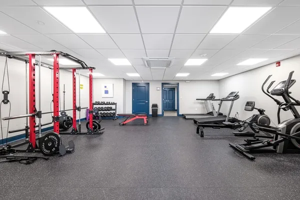 a view of a room with gym equipment