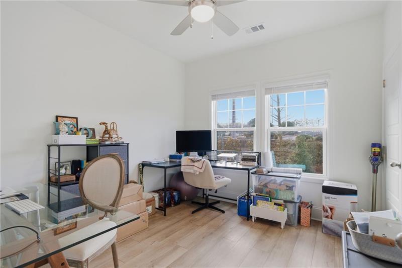 3158 Webb Road Milton, GA 30004 - Photo 16 of 36 a workspace with furniture window and wooden floor