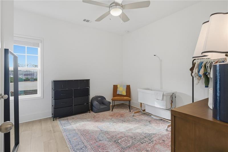 3158 Webb Road Milton, GA 30004 - Photo 23 of 36 a view of a workspace with furniture and a window