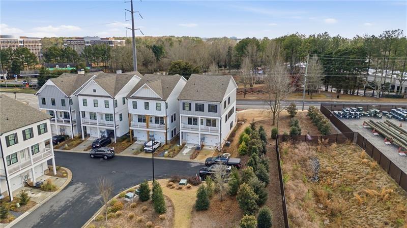 3158 Webb Road Milton, GA 30004 - Photo 30 of 36 a aerial view of a house with swimming pool and trees