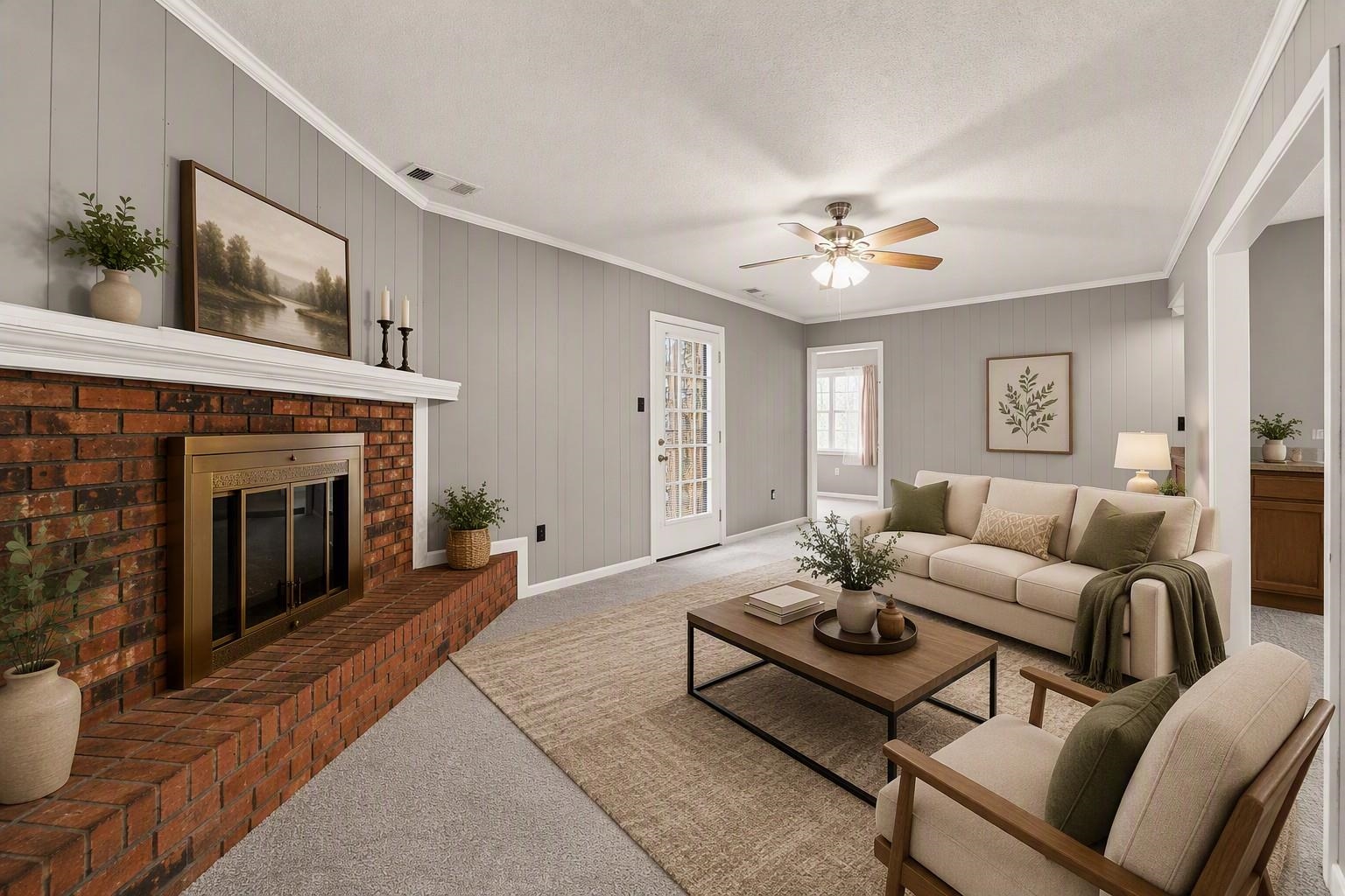 4920 Whitworth Road Memphis, TN 38116 - Photo 11 of 32 Brick fireplace with a substantial hearth, recessed firebox, and a white mantel
