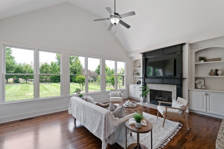 3624 Lime Valley Bridge Road Thompson's Station, TN 37179 - Photo 15 of 69 a living room with furniture fireplace and a large window