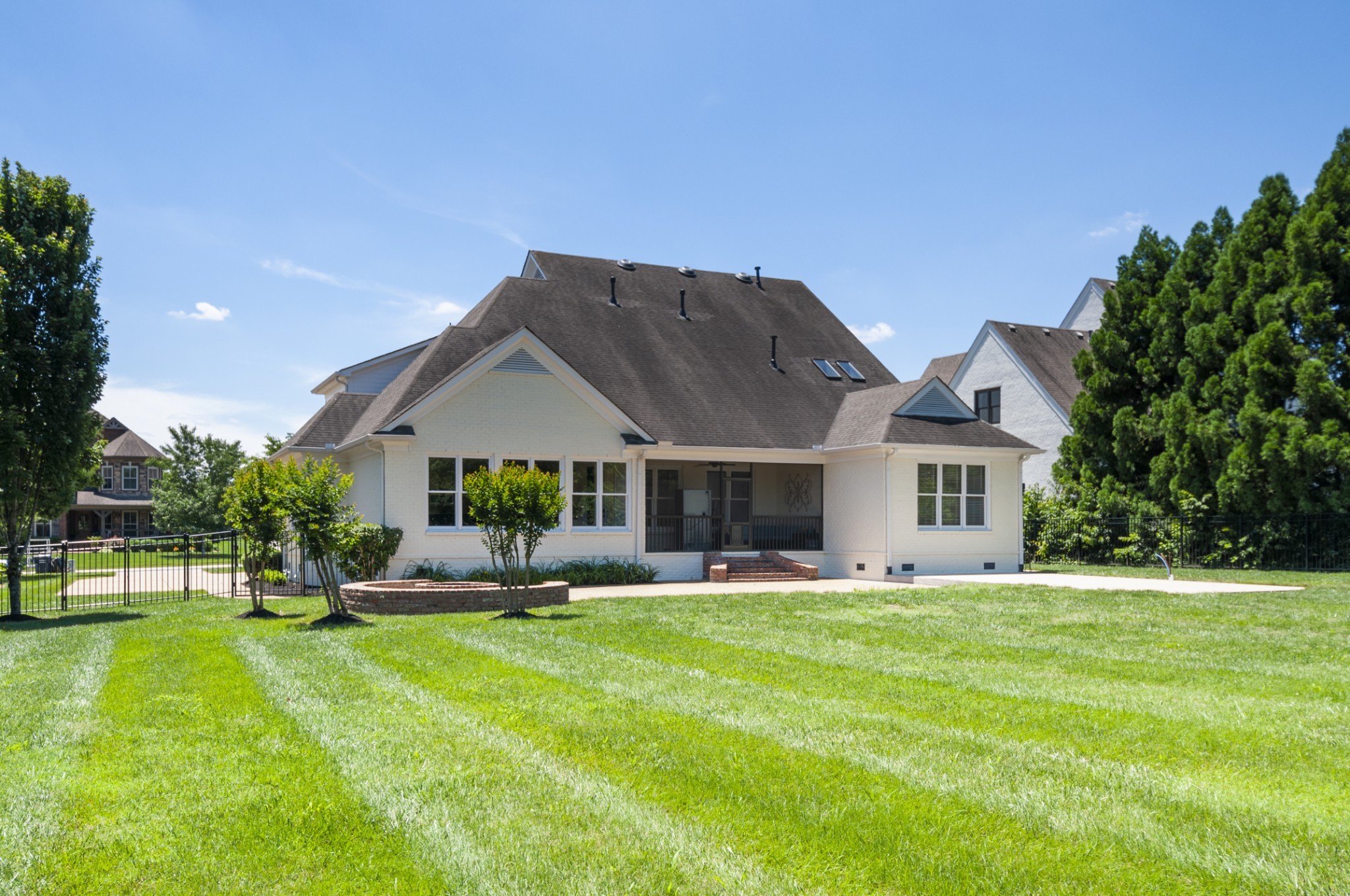 3624 Lime Valley Bridge Road Thompson's Station, TN 37179 - Photo 21 of 69 a front view of a house with a yard and trees