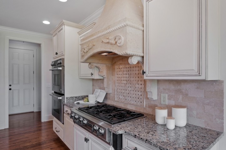 3624 Lime Valley Bridge Road Thompson's Station, TN 37179 - Photo 32 of 69 a kitchen with a stove and wooden floor