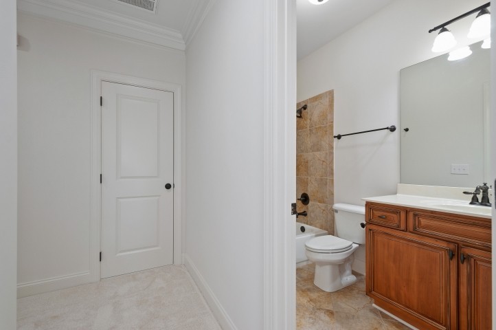 3624 Lime Valley Bridge Road Thompson's Station, TN 37179 - Photo 48 of 69 a bathroom with a granite countertop toilet a sink and a mirror