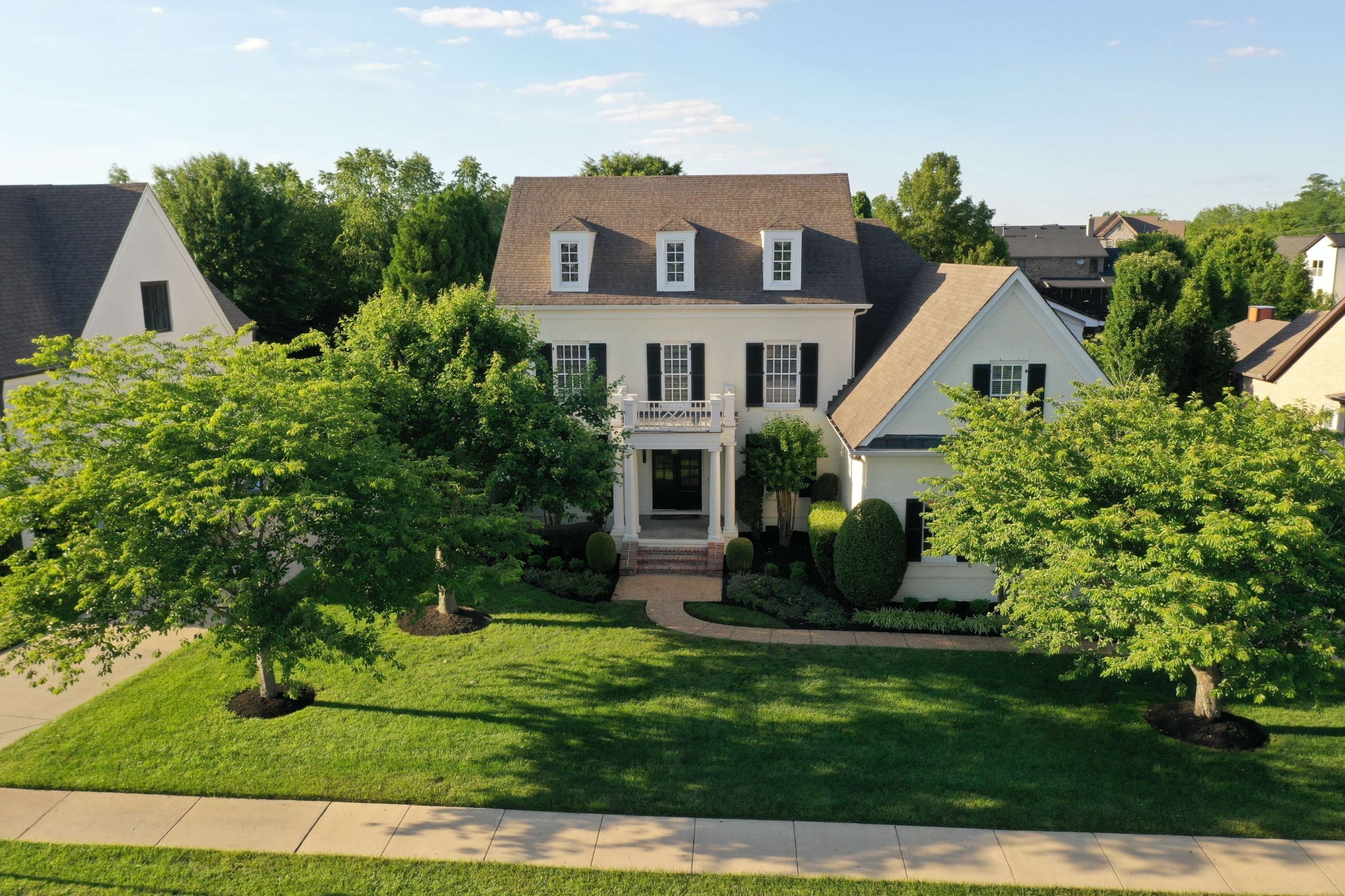 3624 Lime Valley Bridge Road Thompson's Station, TN 37179 - Photo 69 of 69 a front view of a house with a garden