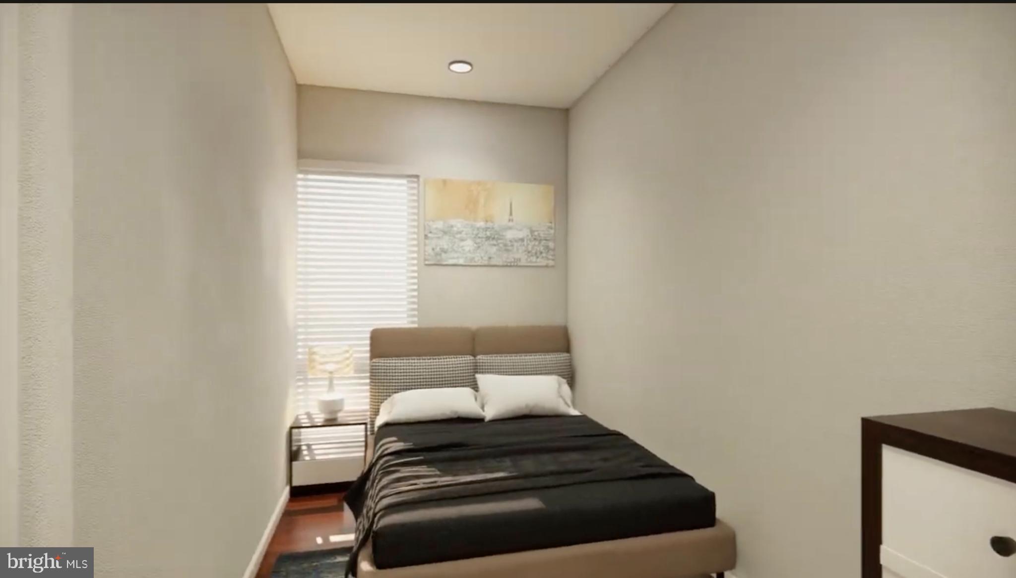 950 25th Street Northwest, Unit 607N Washington, DC 20037 - Photo 11 of 36 a bedroom with a bed and a window