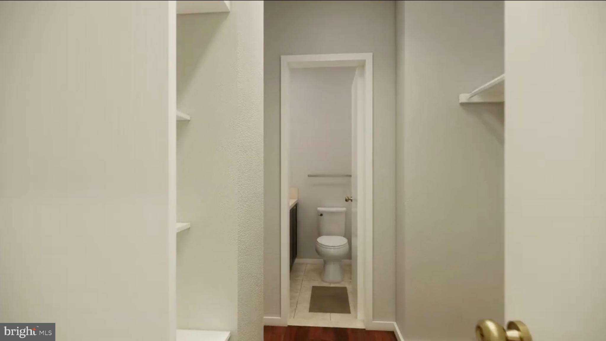 950 25th Street Northwest, Unit 607N Washington, DC 20037 - Photo 14 of 36 a bathroom with a glass shower door