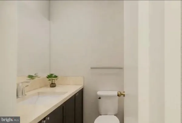 a city view with tall buildings and cars