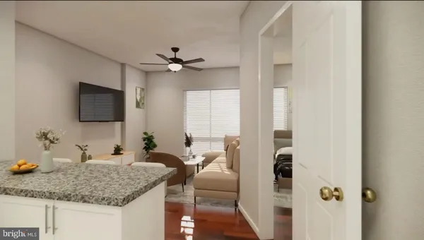 a kitchen with a refrigerator and a stove