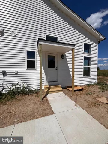 a view of a house with a patio