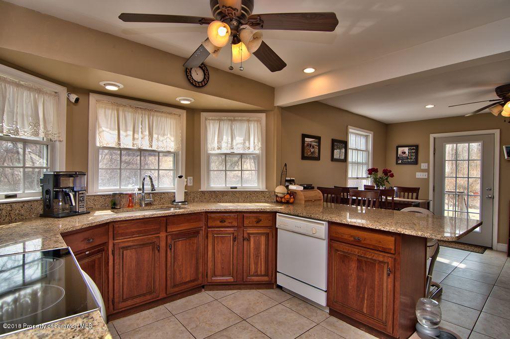 2050 Reservoir Road Moscow, PA 18444 - Photo 20 of 44 a kitchen with lots of counter space and a sink