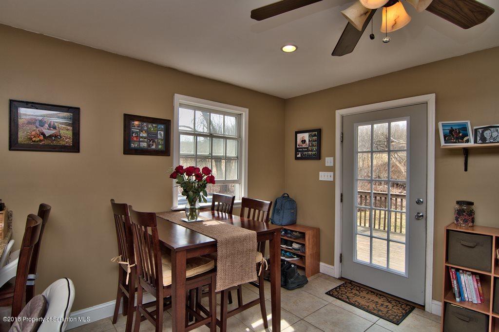 2050 Reservoir Road Moscow, PA 18444 - Photo 22 of 44 a dining room with furniture and window