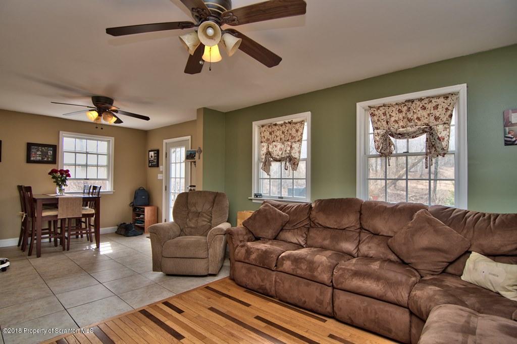 2050 Reservoir Road Moscow, PA 18444 - Photo 23 of 44 a living room with furniture and a window