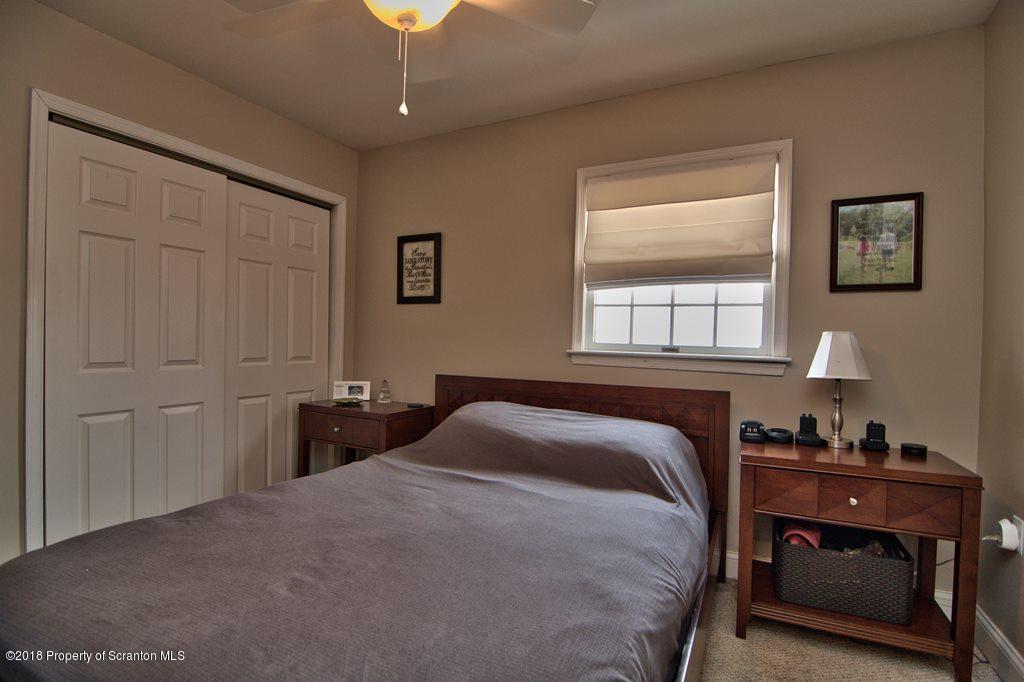 2050 Reservoir Road Moscow, PA 18444 - Photo 29 of 44 a bedroom with a bed and a window
