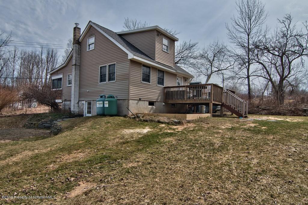 2050 Reservoir Road Moscow, PA 18444 - Photo 6 of 44 a front view of house with yard