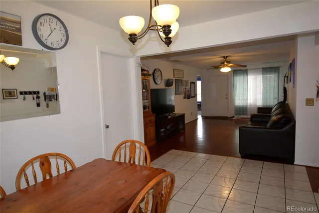 a bedroom with furniture and a chandelier