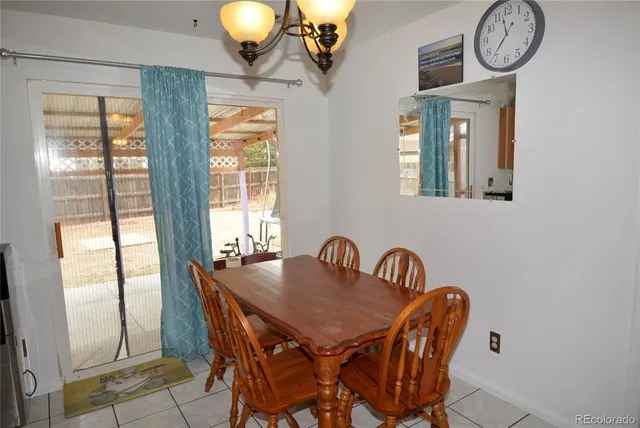 a bedroom with furniture and wooden floor