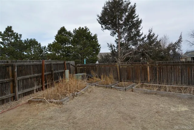 a kitchen with a sink stove and microwave