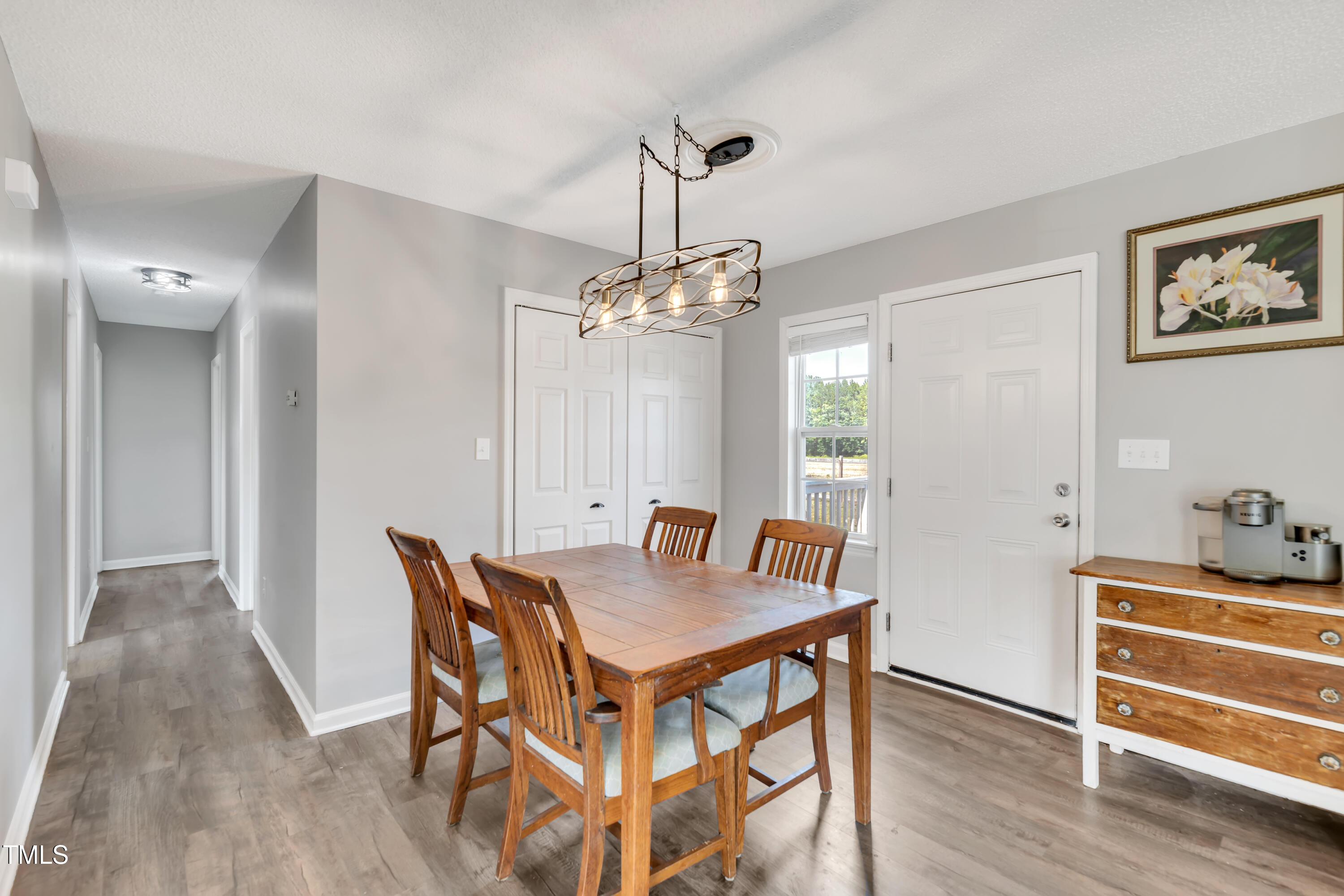 640 Short Journey Road Smithfield, NC 27577 - Photo 10 of 27 a dining room with furniture and window
