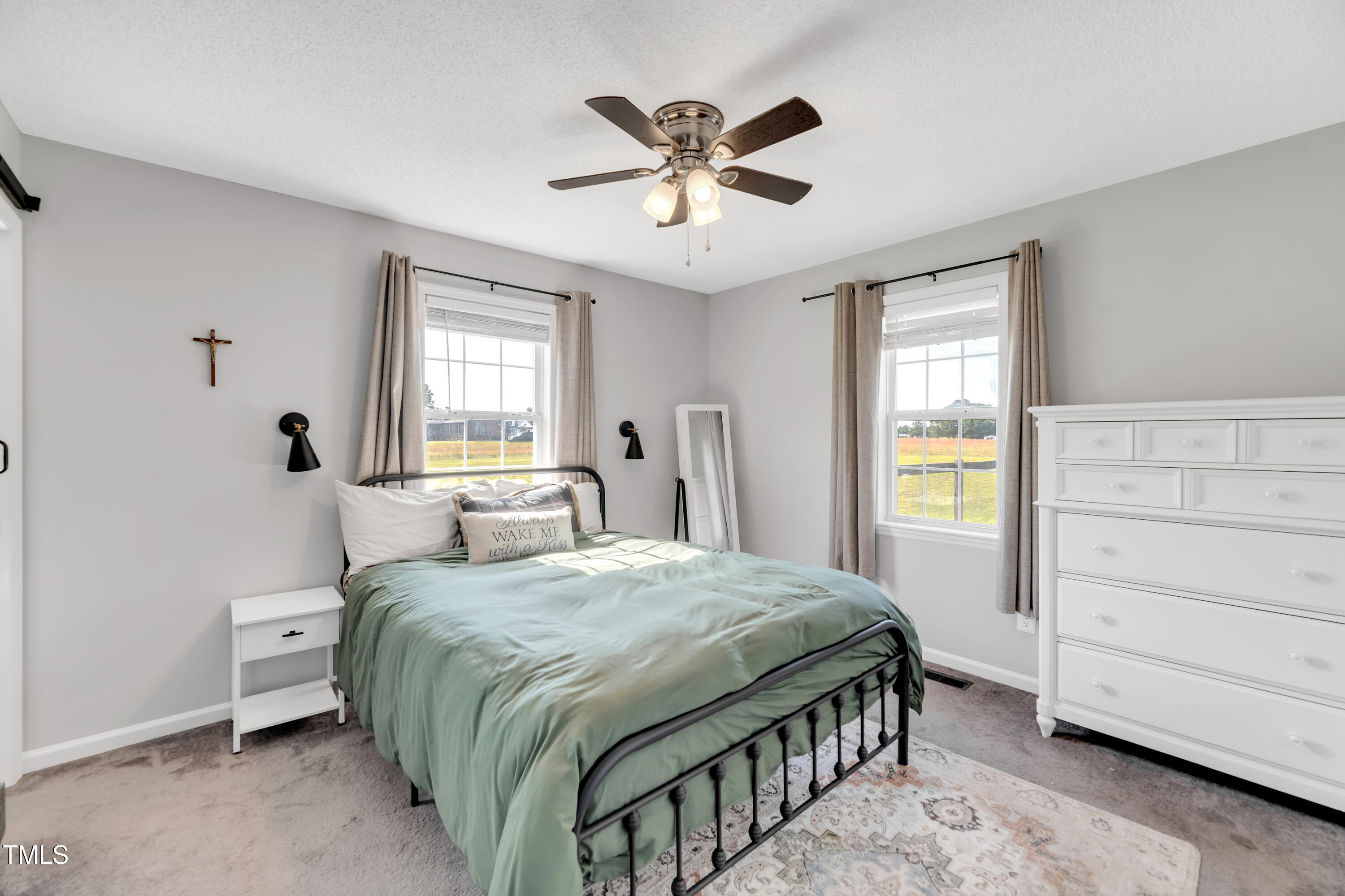 640 Short Journey Road Smithfield, NC 27577 - Photo 11 of 27 a bedroom with a bed and a window