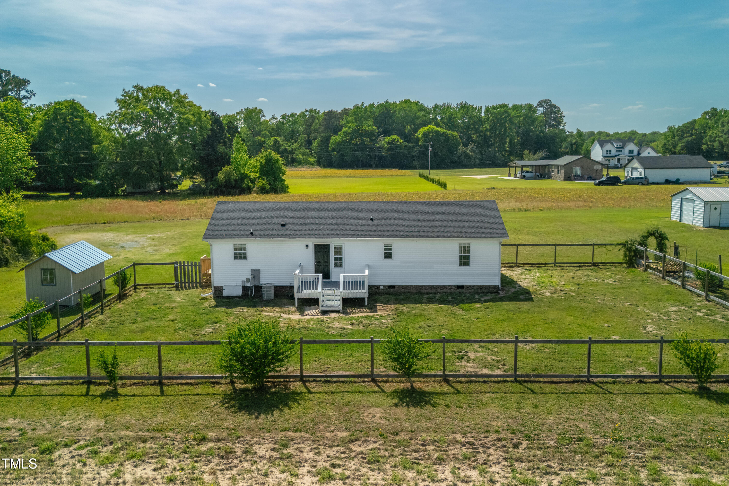 640 Short Journey Road Smithfield, NC 27577 - Photo 17 of 27 a view of a swimming pool with a yard
