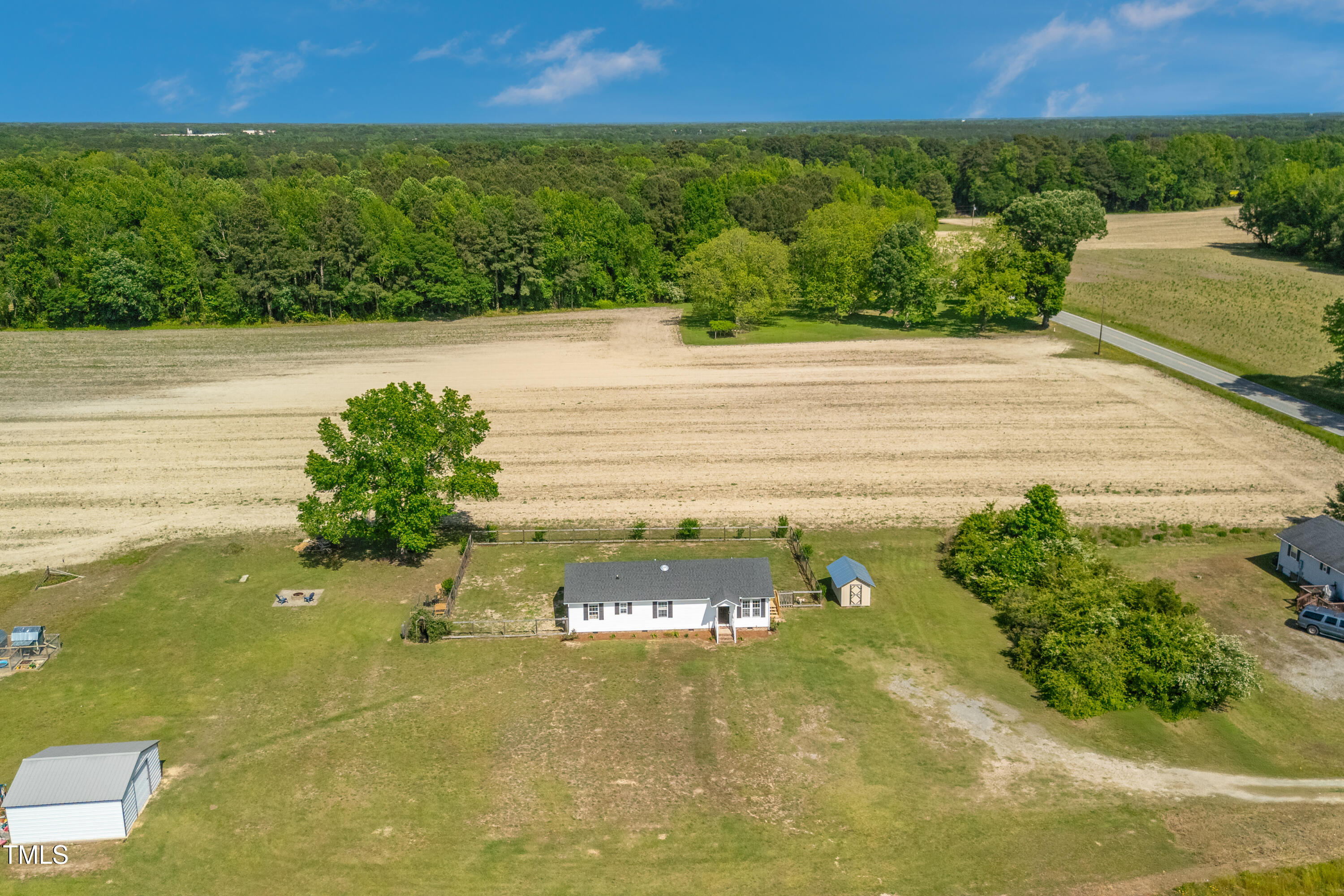 640 Short Journey Road Smithfield, NC 27577 - Photo 20 of 27 a view of a pathway with a lake