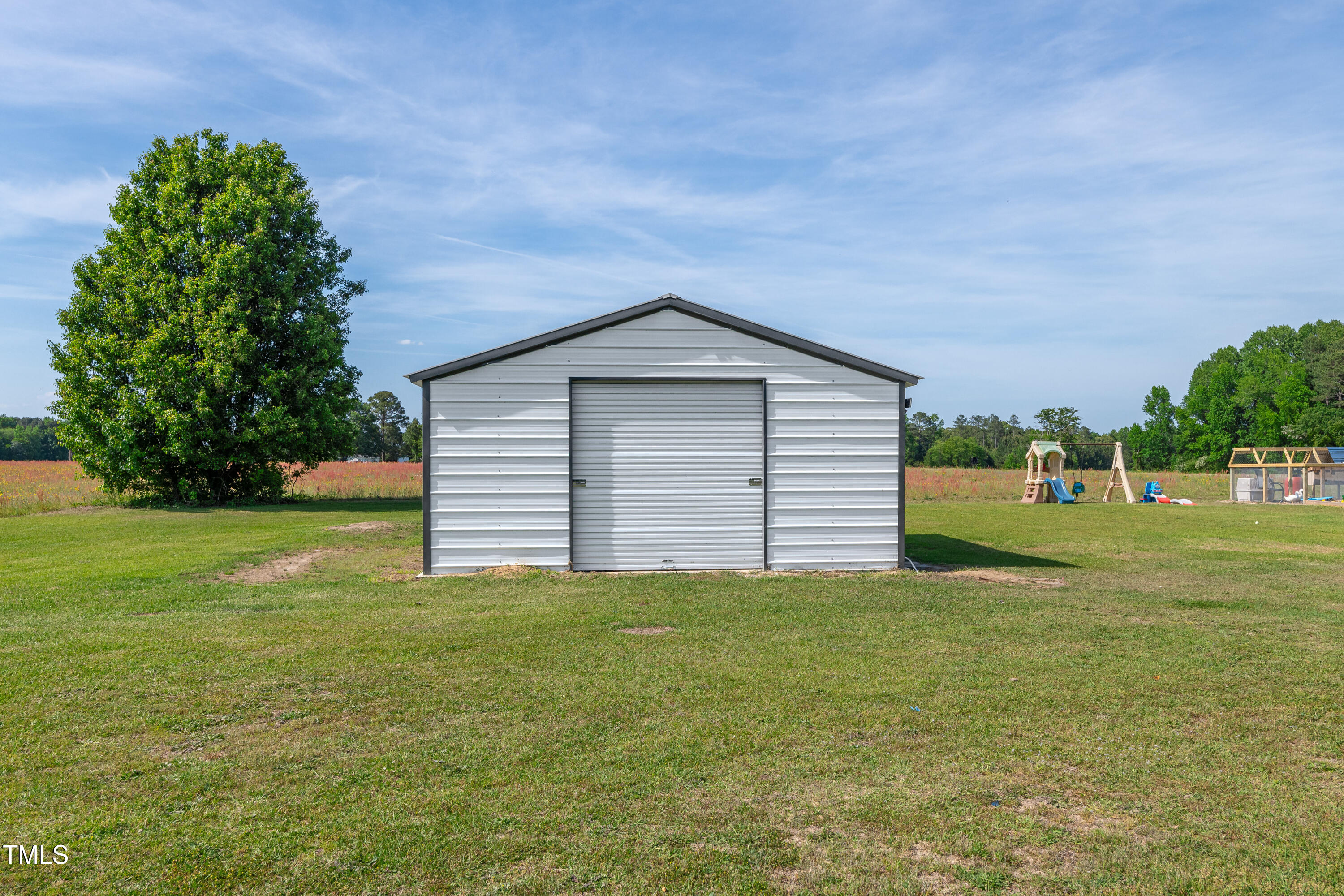 640 Short Journey Road Smithfield, NC 27577 - Photo 21 of 27 a view of a house with a yard