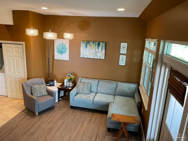 a living room with furniture and a couch