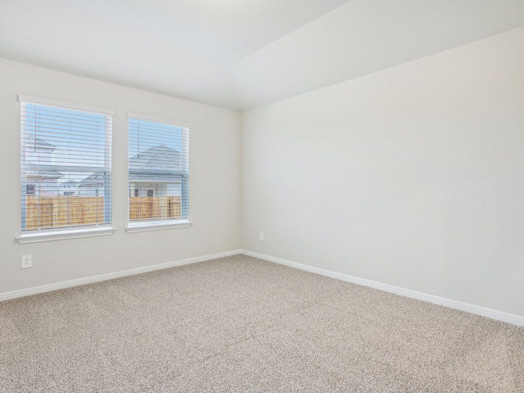 104 Honey Bee Road Jarrell, TX 76537 - Photo 11 of 17 a view of an empty room with a window