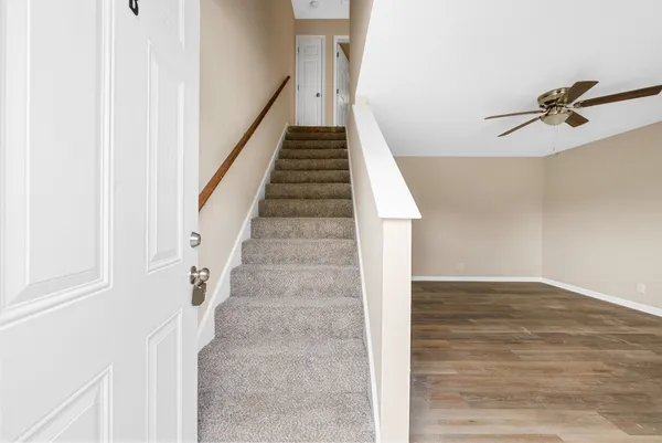 a view of staircase with white walls and white walls